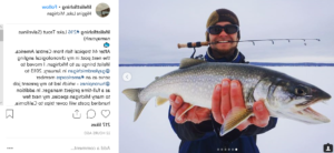 AmeriCorps Member with Fish